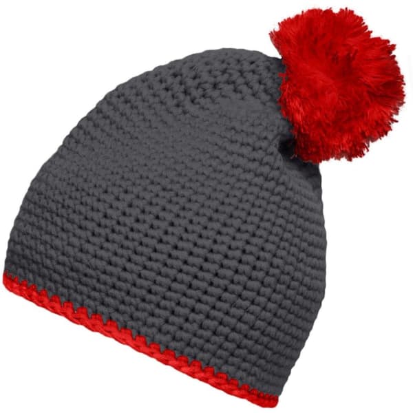 A grey knitted pompon hat with a red contrast stripe and a red pompom on top. It features a logo.