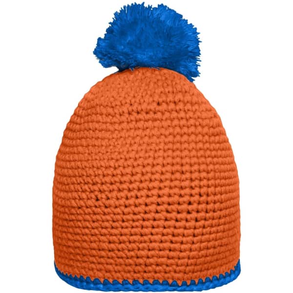 An orange knitted hat with a blue pompom and a blue contrast stripe at the base. It features a logo.