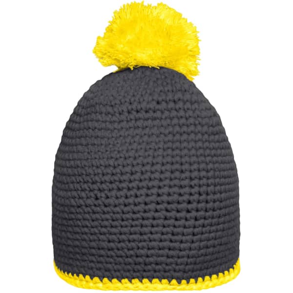 A grey knitted beanie with a yellow pompom on top and a yellow contrast stripe around the base.