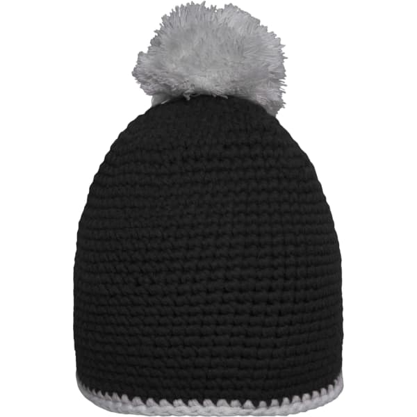 A beanie featuring a black knitted design with a contrasting white stripe and a fluffy grey pom-pom on top.