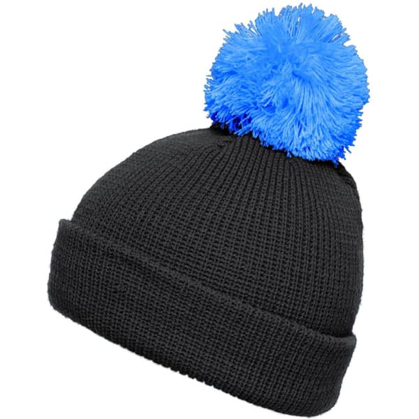 A black knitted hat with a large blue pompon on top. It features a brim and has a logo on the side.