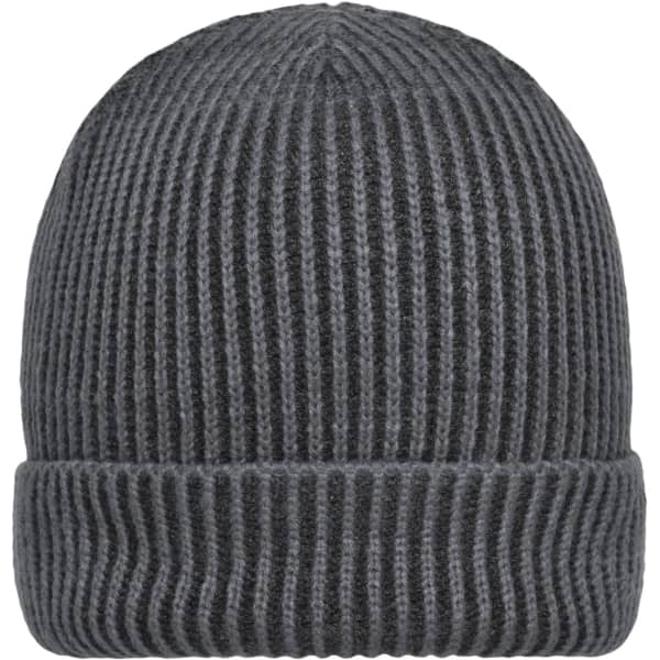 A ribbed beanie in dark grey, featuring a fold-over cuff and a textured design. It has a branding logo.