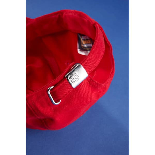 A red 5 panel cap featuring a metal adjustment buckle on the back and a logo inside.