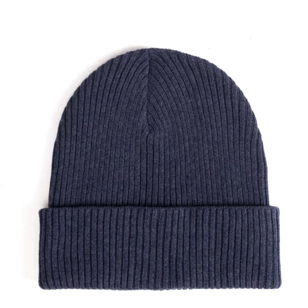 A ribbed beanie in navy blue featuring a folded cuff and a textured design. It has a logo on the side.