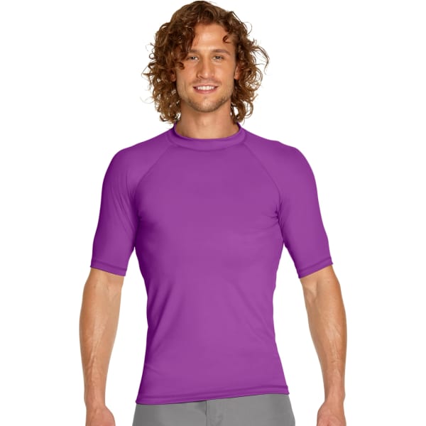 A purple short sleeve rash guard with a fitted design, featuring a logo on the upper chest area.