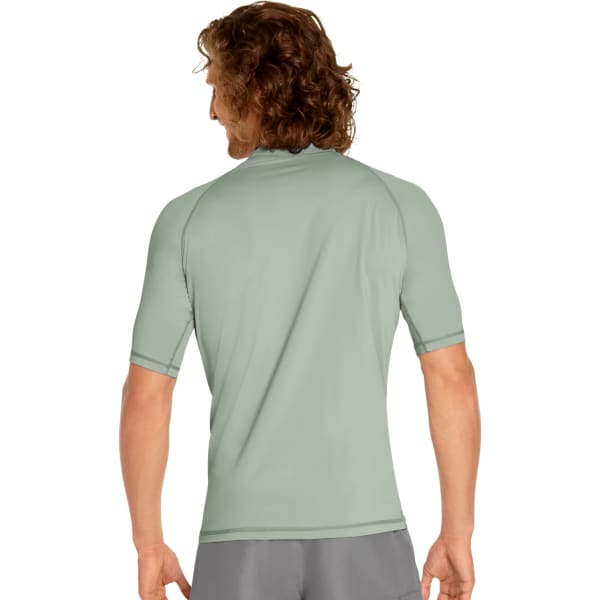 A short sleeve rash guard in a muted green colour, featuring a back view and a logo on the upper sleeve.