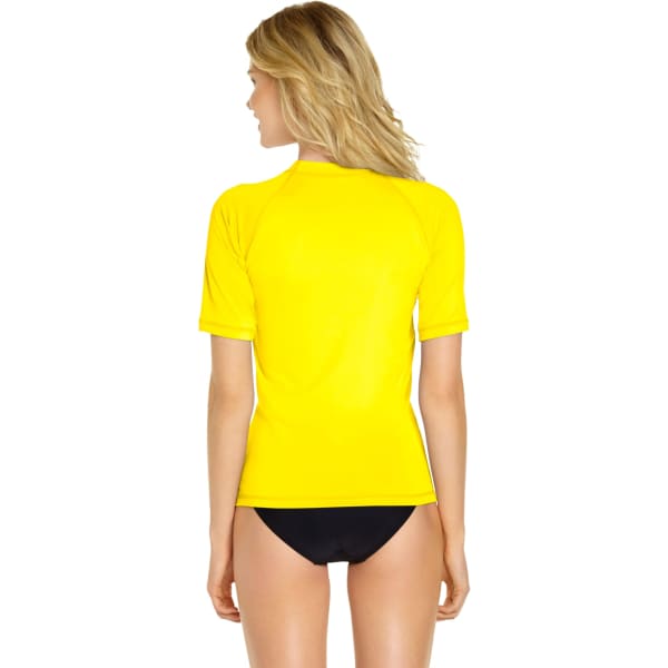 A yellow short sleeve rash guard with a fitted design and a branded logo at the back, shown on a model.