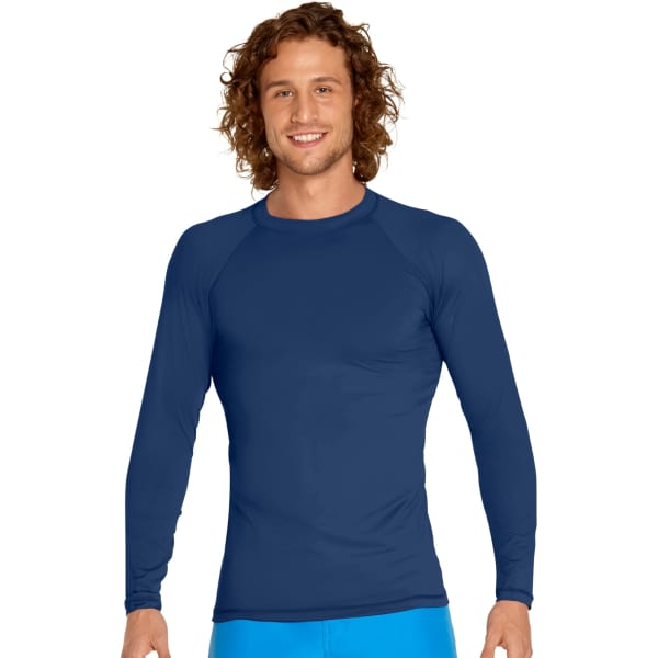A man in a navy long sleeve rash guard, featuring a fitted design and a subtle logo on the chest.