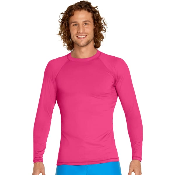 A long sleeve rash guard in vibrant pink, featuring a logo on the chest area, worn by a smiling man.