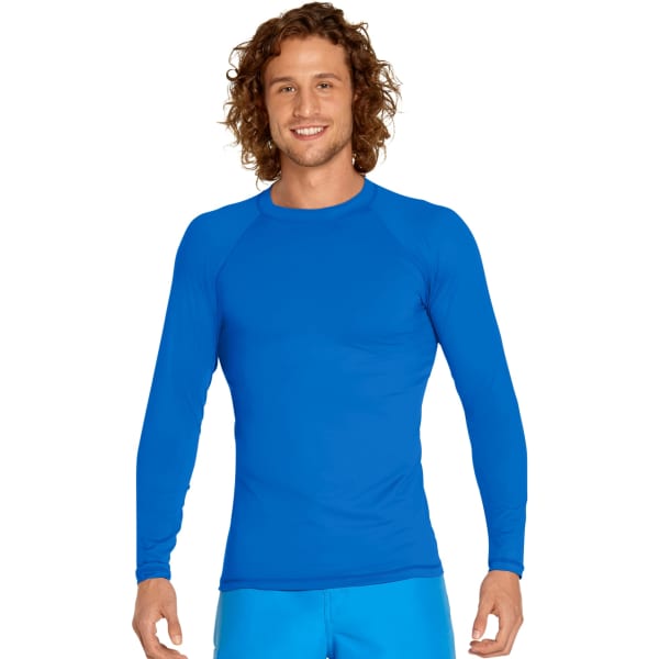 A blue long sleeve rash guard featuring UPF 50+ protection, worn by a smiling man with curly hair.