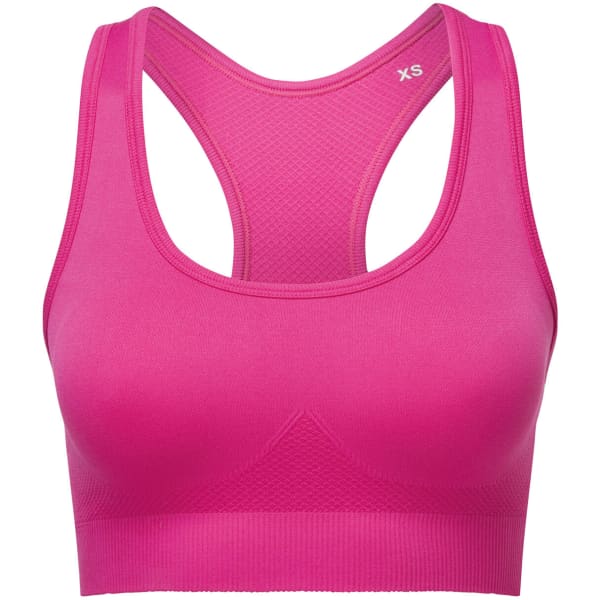 A pink sports bra featuring a seamless design with a strappy back. It has a logo on the side.