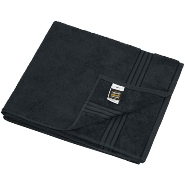 A black sauna sheet folded neatly, featuring a textured surface and a label.