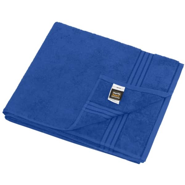 A blue sauna sheet with a textured surface and a folded corner, featuring a branding label.
