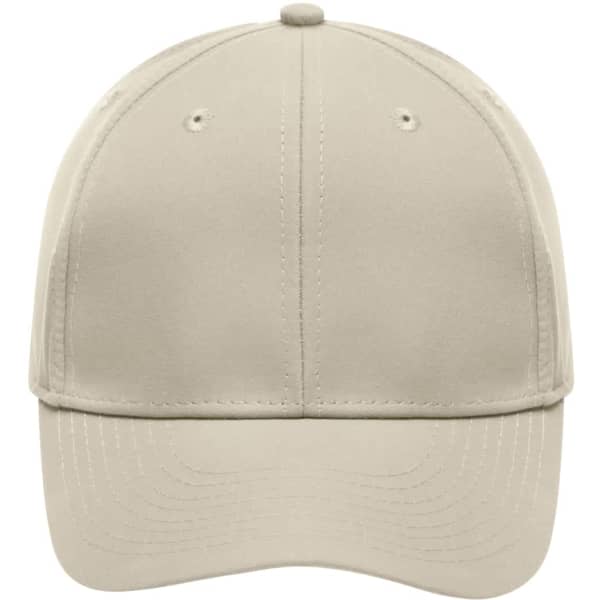 A beige 6 panel polyester peach cap with a curved brim and a logo on the front.