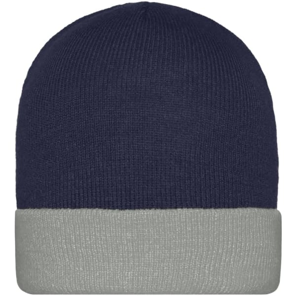 A knitted cap in navy blue with a light grey folded cuff. Features a logo on the side.