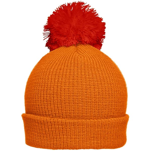 An orange knitted hat with a large red pompom on top, featuring a thick cuff. It has a logo on the side.