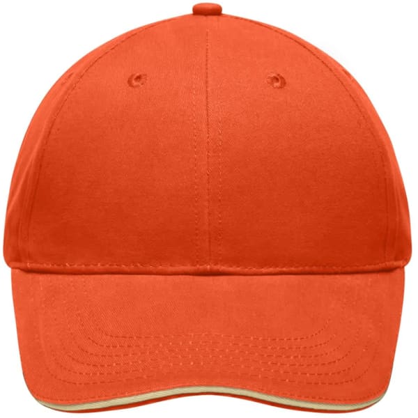 An orange cap with a curved brim, featuring a logo on the front and a contrasting trim at the base.