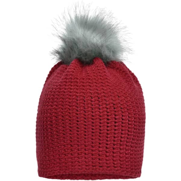 A red crocheted beanie topped with a fluffy grey pom-pom, featuring a logo on the side.