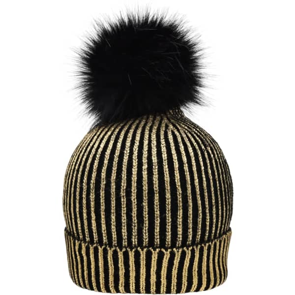 A black and gold metallic beanie featuring a fluffy black pom-pom on top and a ribbed design.