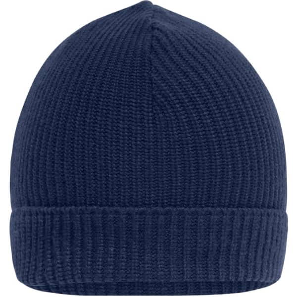 A navy blue ribbed beanie with a rolled cuff and a logo on the side.