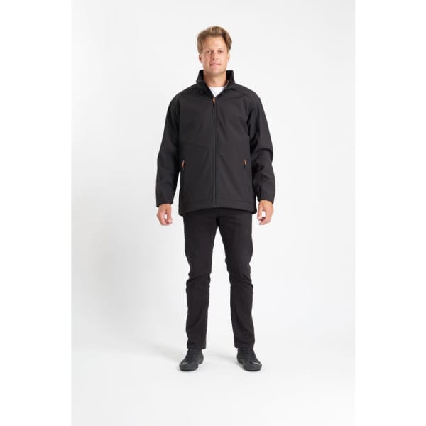 A soft shell jacket in black with contrast zip pulls, worn by a model standing upright.