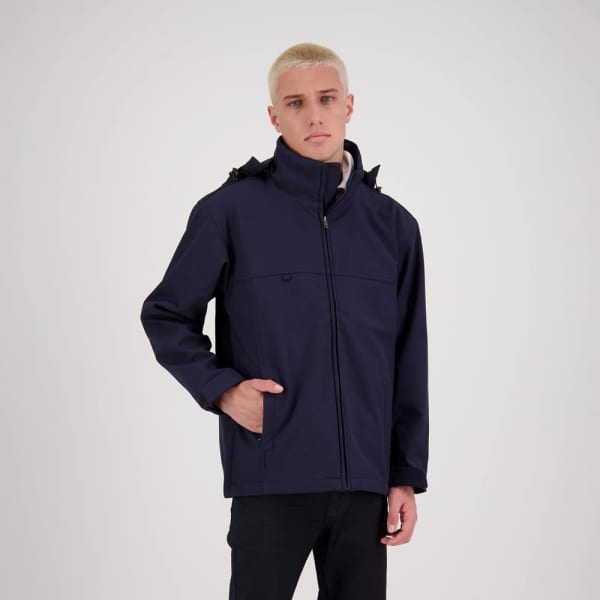 A man wearing a dark navy Bodyguard Jacket with a hood, standing against a neutral background.