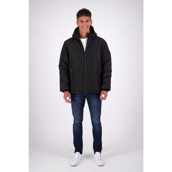 A model wearing a black Luxmore puffer jacket paired with blue jeans and white sneakers, standing against a plain background.