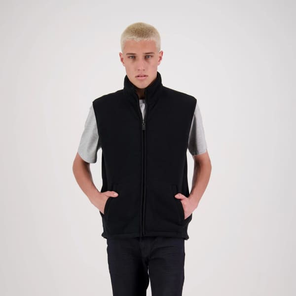 A black microfleece vest with a zip front and side pockets, worn over a grey T-shirt.