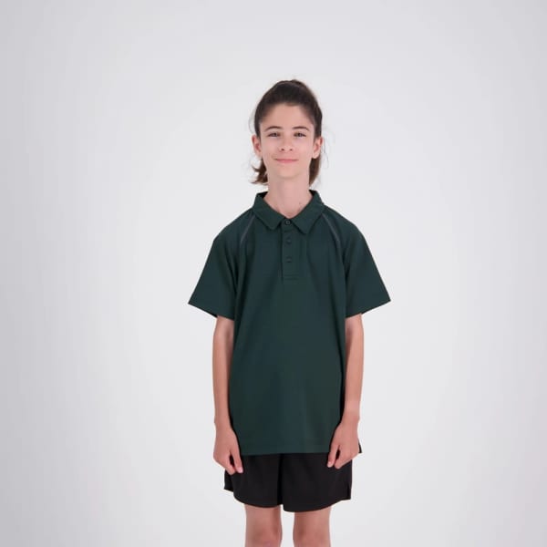 A green XT Performance Polo for kids, featuring a classic polo collar and a simple design. It has a logo on it.