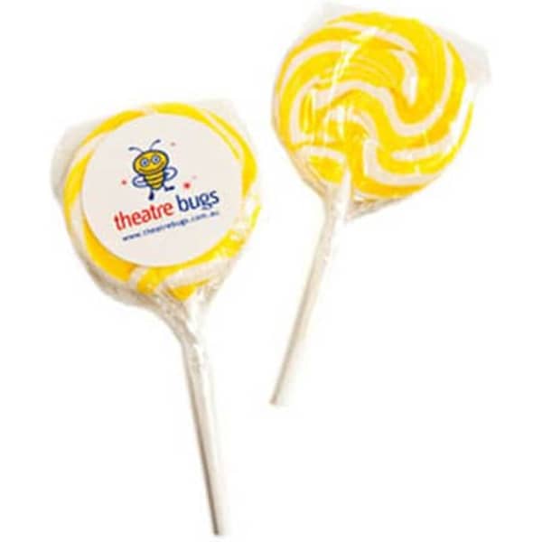 A set of medium yellow candy lollipops, each with a swirled design and wrapped in clear plastic.