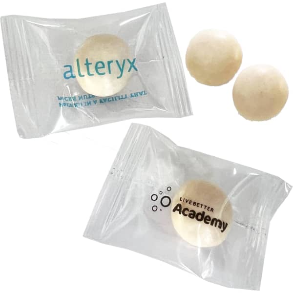 A pack of large, white chewy mints with two individual mints visible inside a clear wrapper featuring logos.