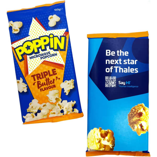 Two packets of microwave popcorn. One is brightly coloured blue and yellow with a butter flavour, while the other is blue with a logo.
