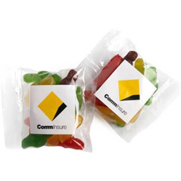 A packet of Jelly Babies featuring assorted colours, including green, red, yellow, and orange, with a logo on the packaging.
