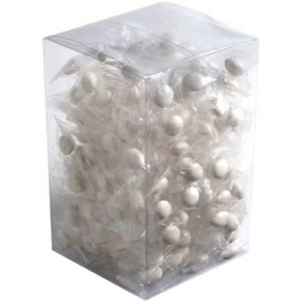 A clear PVC box filled with individually wrapped chewy mint candies. The mints are white in colour.