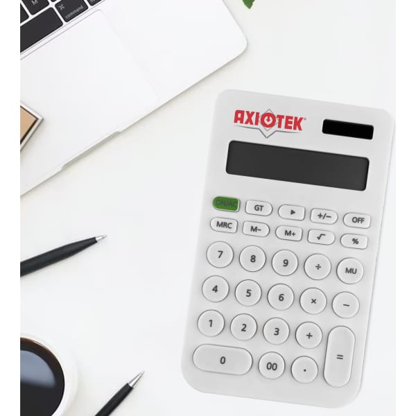 A white calculator with a logo, displaying numbers and various function keys, on a desk with a laptop and stationery.