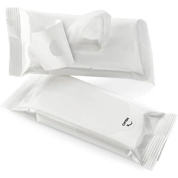 A pack of white anti-bacterial wet wipes, featuring an opening tab, with an additional unopened pack beside it.