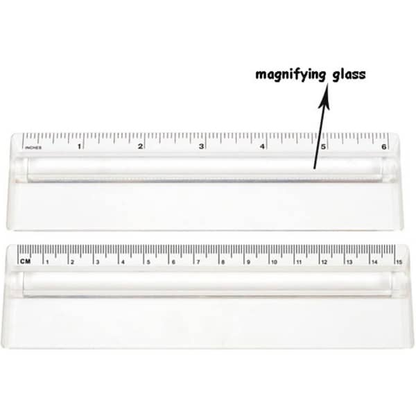 A transparent 15cm ruler featuring a magnifying glass, with clear measurement markings in centimetres and inches.