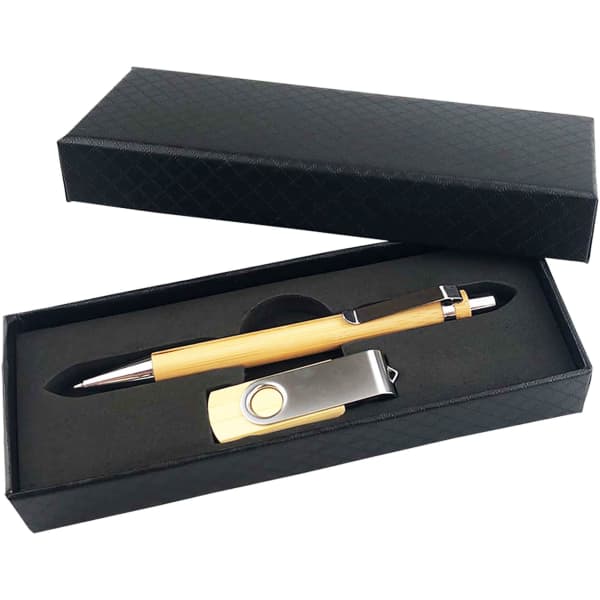 A black gift box containing a wooden pen and a metal USB drive with a logo.