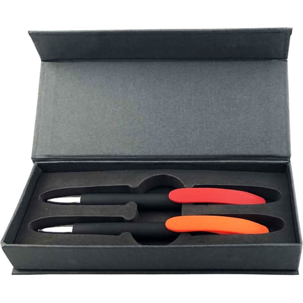 A gift set featuring two black pens with red and orange accents in a sleek grey box.