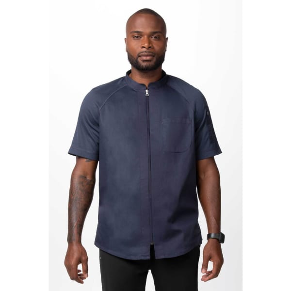 A men's chef jacket in navy blue featuring short sleeves, a zip front closure, and a chest pocket.