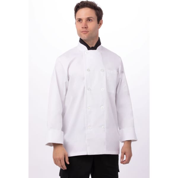 A white chef's jacket featuring a double-breasted design with buttons, worn by a model.