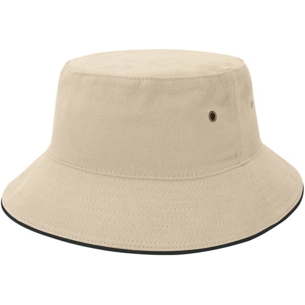 A beige bucket hat featuring a wide brim and eyelets, with a contrasting trim around the base.