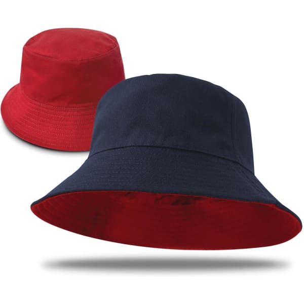 A reversible bucket hat featuring red on one side and navy blue on the other, with a branded logo.