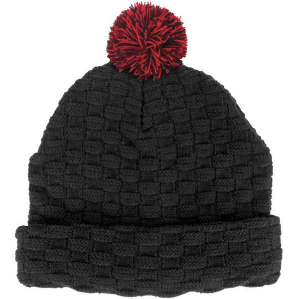 A black textured beanie with a red pom pom on top. It features a folded brim and has a branding logo.