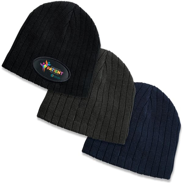 A collection of three cable knit beanies in black, olive green, and navy blue, each featuring a logo.