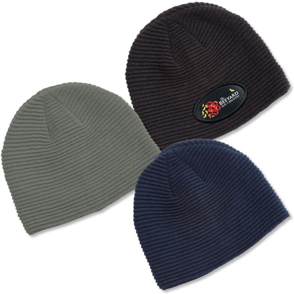 Three Ruga Knit Beanies in dark green, black, and navy, featuring a branded logo on the black beanie.