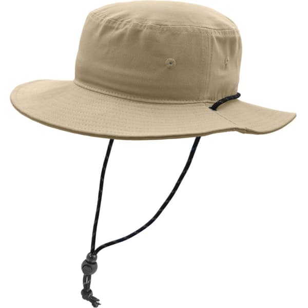 A tan bucket hat with a wide brim and adjustable chin strap, featuring a logo.