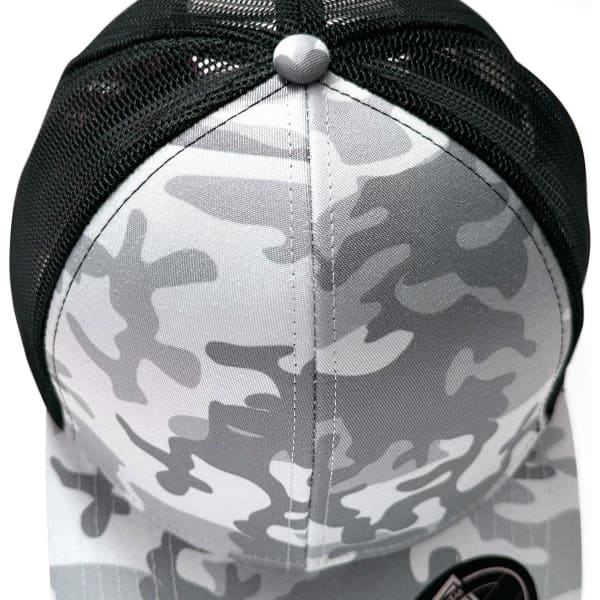 A grey and black trucker cap featuring a snow camouflage pattern and a mesh back, with a circular button on top.