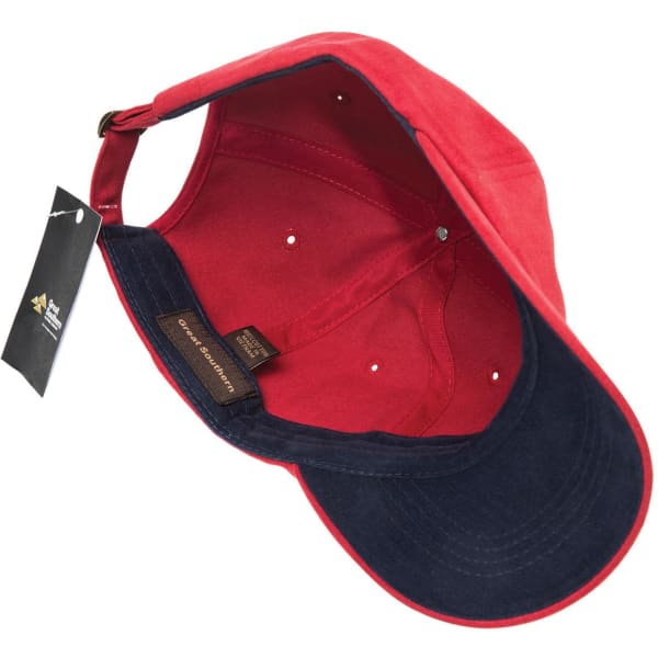 A red and navy cap with a branded tag, featuring an interior view showcasing its brushed cotton design.