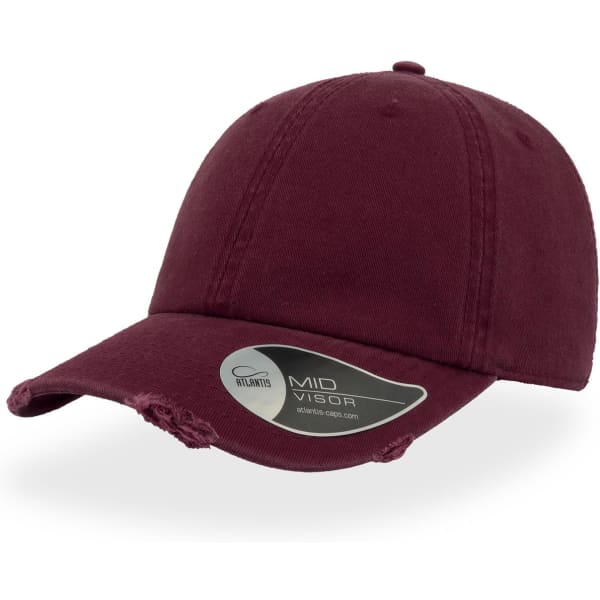 A maroon cap with a distressed design and a mid visor, featuring a logo sticker on the brim.